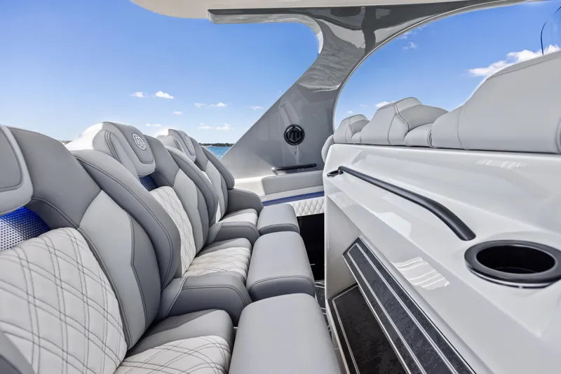  Yacht Photos Pics Luxurious seating on 2026 Mystic Powerboats M4200, featuring sleek design and premium materials.