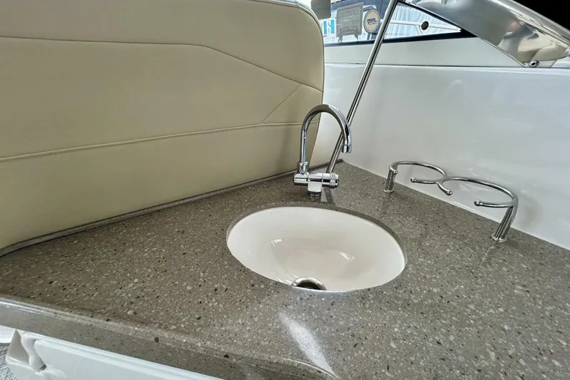  Yacht Photos Pics 2011 Regal 38 Express yacht sink with modern faucet and countertop.