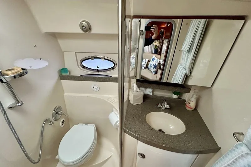  Yacht Photos Pics Bathroom of 2011 Regal 38 Express yacht with shower, sink, and toilet.