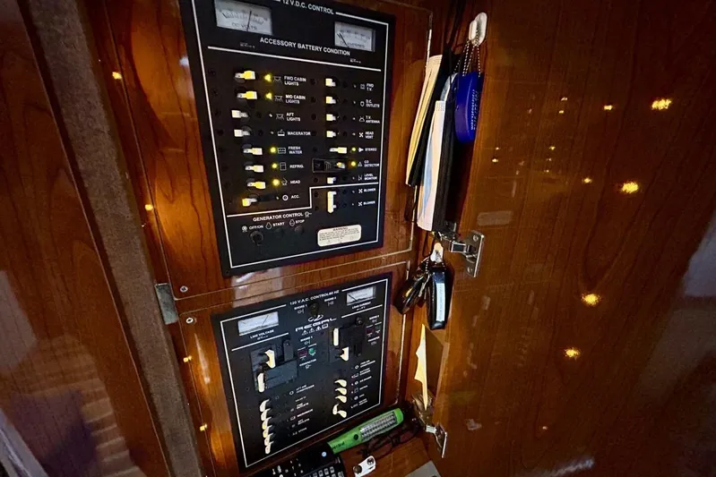 Yacht Photos Pics Control panel inside 2011 Regal 38 Express yacht, featuring switches and keys.