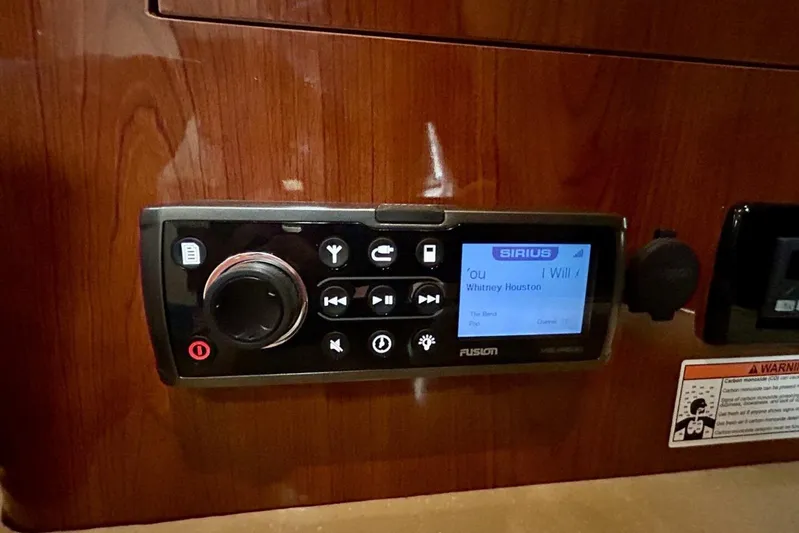 Yacht Photos Pics Fusion stereo system on 2011 Regal 38 Express boat, playing Whitney Houston.