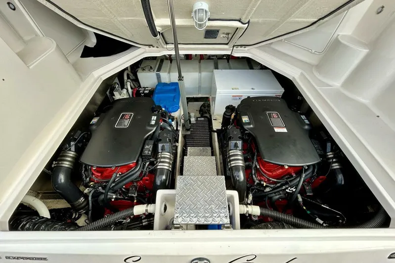  Yacht Photos Pics Engine compartment of a 2011 Regal 38 Express boat, featuring dual engines.