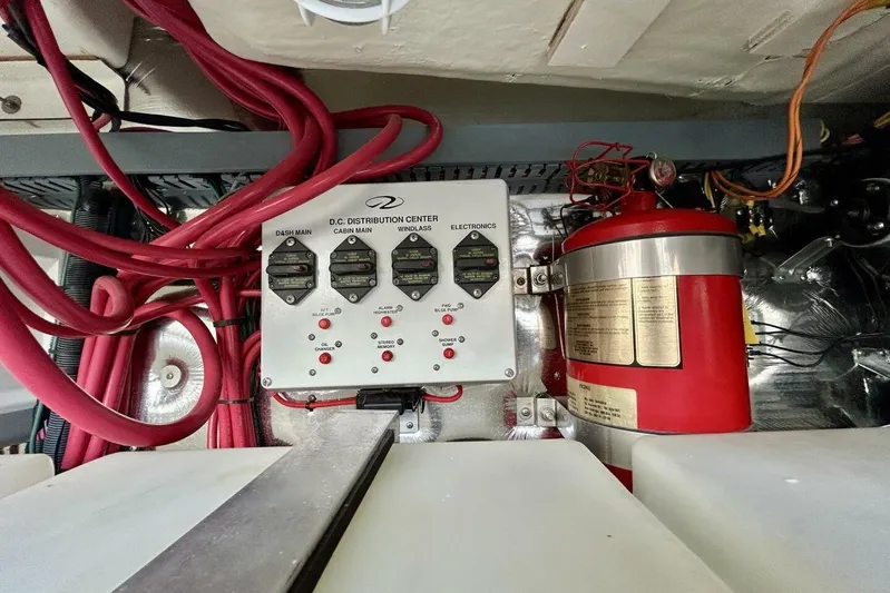  Yacht Photos Pics Electrical panel and fire extinguisher in 2011 Regal 38 Express boat engine room.