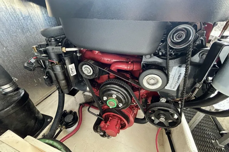  Yacht Photos Pics Engine compartment of a 2011 Regal 38 Express boat, featuring Volvo Penta components.