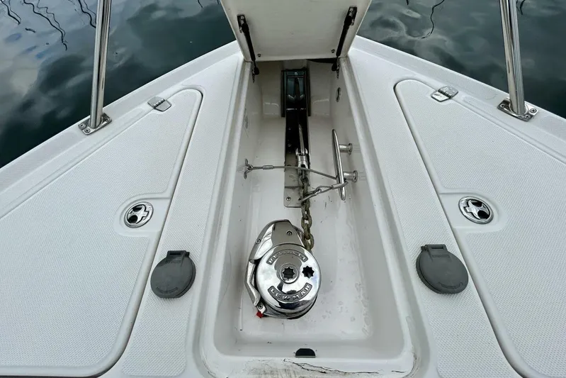  Yacht Photos Pics 2011 Regal 38 Express boat anchor compartment with winch and chain.