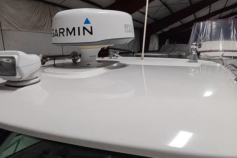  Yacht Photos Pics 2015 Boston Whaler 285 Conquest with Garmin xHD radar in a storage facility.