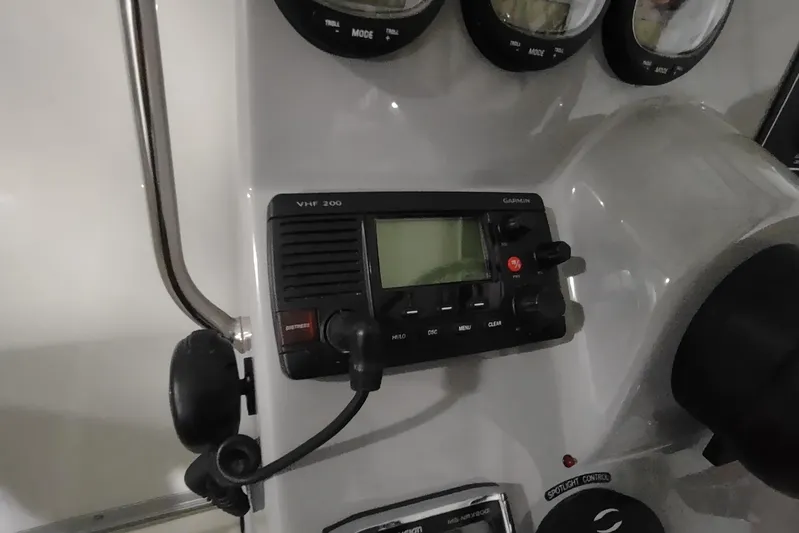  Yacht Photos Pics Control panel of a 2015 Boston Whaler 285 Conquest with Garmin VHF 200 radio.