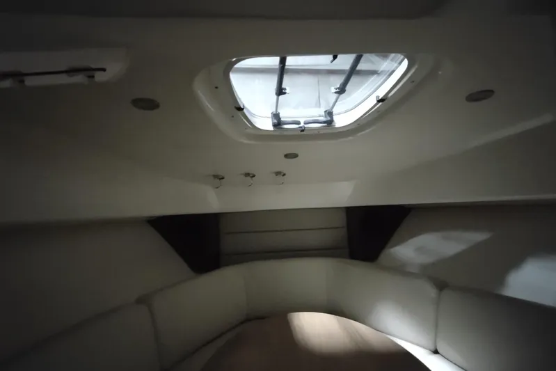  Yacht Photos Pics Interior cabin of 2015 Boston Whaler 285 Conquest with skylight and seating area.
