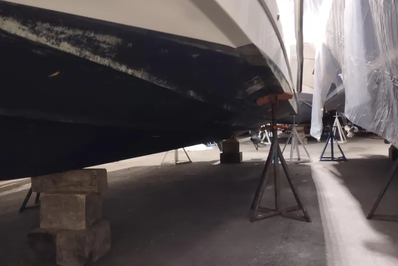  Yacht Photos Pics 2015 Boston Whaler 285 Conquest boat on stands in a storage facility.