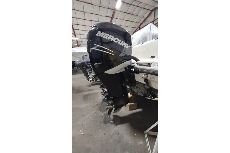  Yacht Photos Pics 2015 Boston Whaler 285 Conquest with Mercury Verado outboard engine in storage.