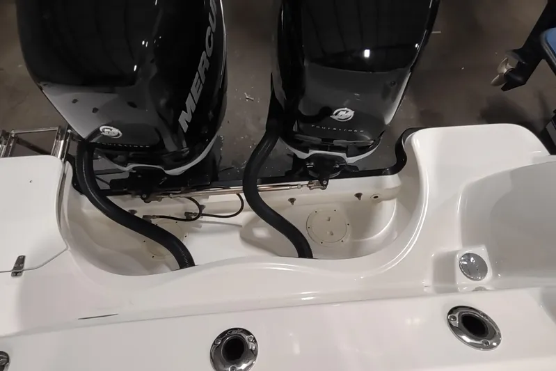  Yacht Photos Pics 2015 Boston Whaler 285 Conquest with dual Mercury outboard engines, rear view.