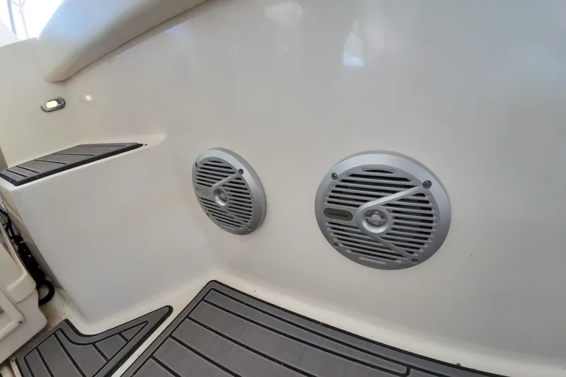Sun Baked Yacht Photos Pics 1999 Tiara Yachts 3500 Express boat speakers and deck detail.