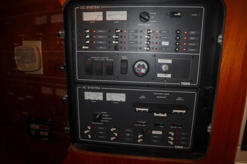 Sun Baked Yacht Photos Pics Electrical control panel on a 1999 Tiara Yachts 3500 Express boat.