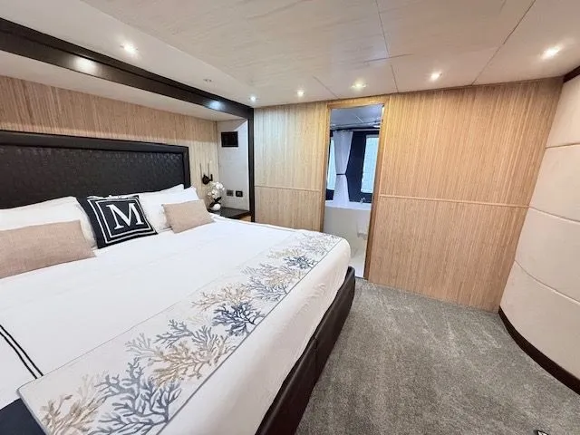 Mia Yacht Photos Pics Luxurious bedroom on the Contenzo Eagle 90 yacht, built in 2009.