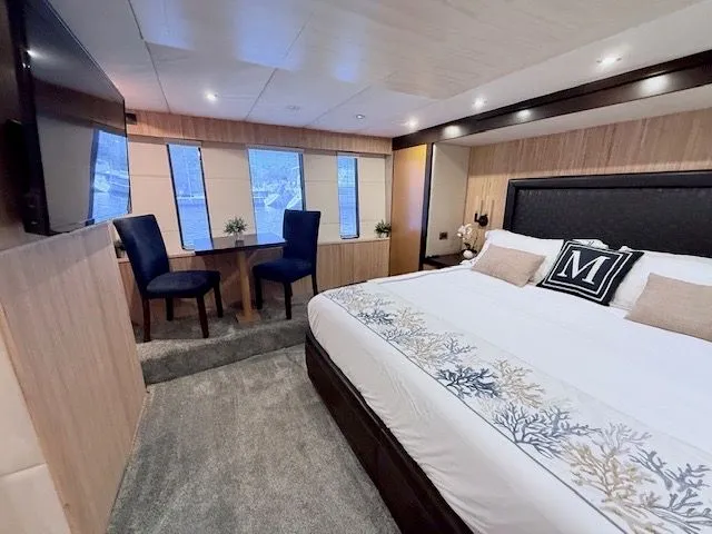 Mia Yacht Photos Pics Luxurious bedroom on the Contenzo Eagle 90 yacht, built in 2009.