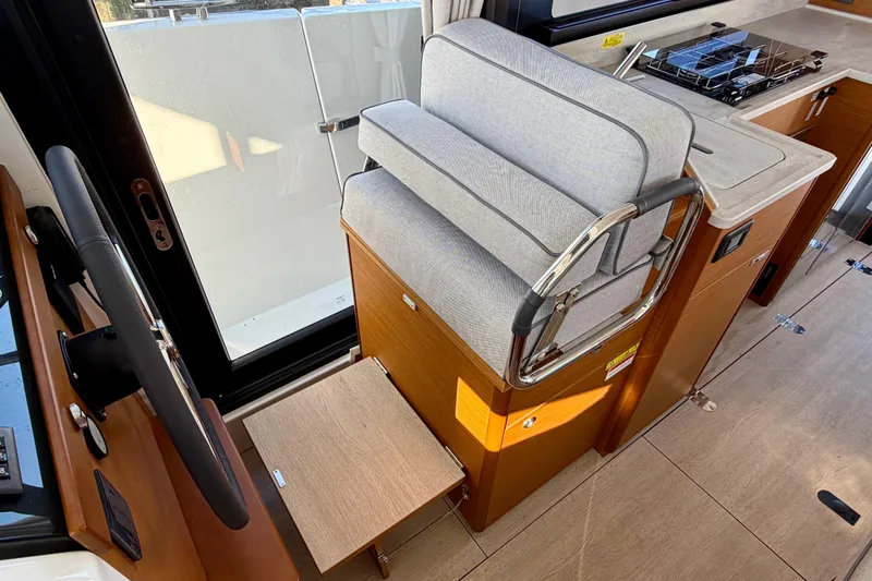  Yacht Photos Pics Interior helm station of 2026 Beneteau Swift Trawler 37 Fly with modern seating.