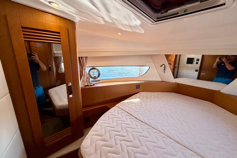  Yacht Photos Pics Luxurious cabin interior of 2026 Beneteau Swift Trawler 37 Fly yacht.