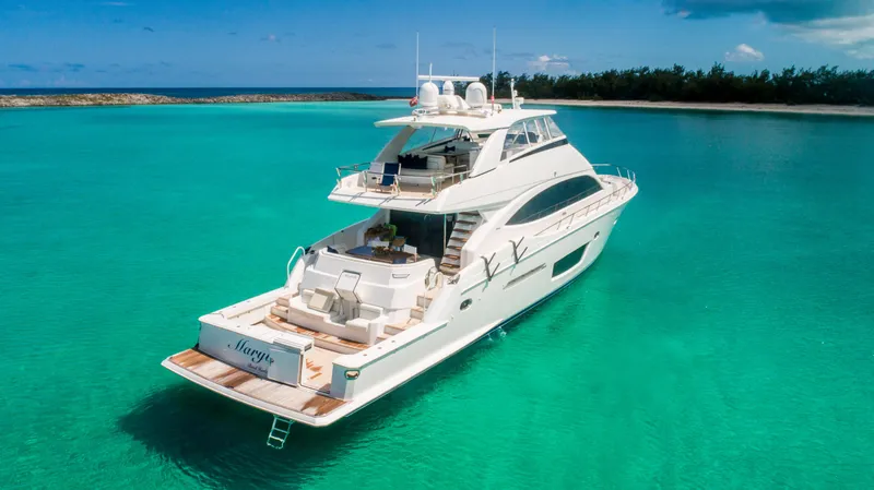 Marybelle Yacht Photos Pics 2017 Viking 82 Cockpit Motor Yacht on turquoise waters, clear sky background.