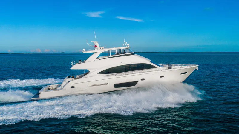 Marybelle Yacht Photos Pics 2017 Viking 82 Cockpit Motor Yacht cruising on open water.