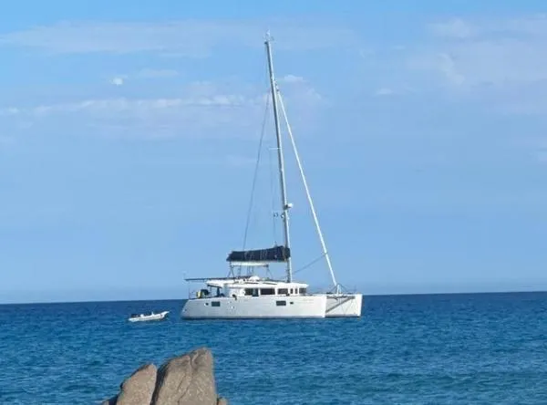 Angels Share Yacht Photos Pics 2015 Lagoon 450 F catamaran sailing on calm blue sea.