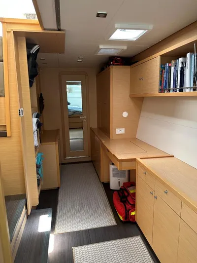 Angels Share Yacht Photos Pics Interior of 2015 Lagoon 450 F yacht with wooden cabinetry and modern design.