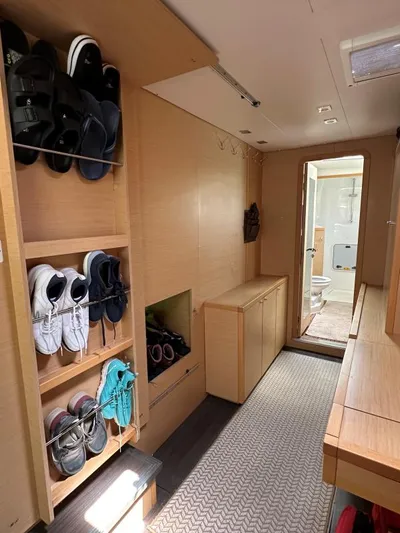 Angels Share Yacht Photos Pics Interior of 2015 Lagoon 450 F yacht with shoe storage and bathroom view.