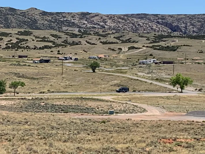 Mv Belle Yacht Photos Pics Rural landscape with scattered houses and a winding road, 1987 Custom Tour Boat and Business.