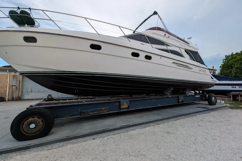  Yacht Photos Pics 1998 Princess 52 Flybridge Motor Yacht on trailer, side view.