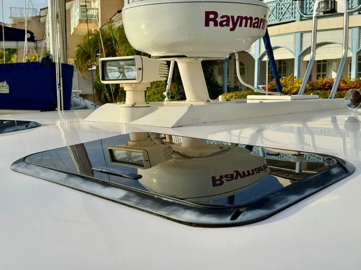  Yacht Photos Pics Apreamare 12m 2001 yacht deck with Raymarine equipment and reflective hatch.