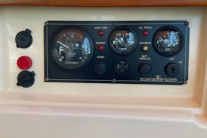 Petrel Yacht Photos Pics Instrument panel of a 2001 Island Packet 420 yacht, featuring gauges and controls.