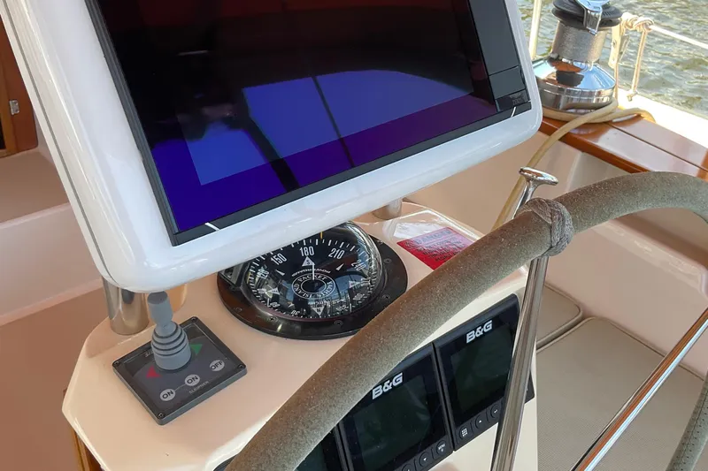 Petrel Yacht Photos Pics Steering console of 2001 Island Packet 420 sailboat with navigation instruments.