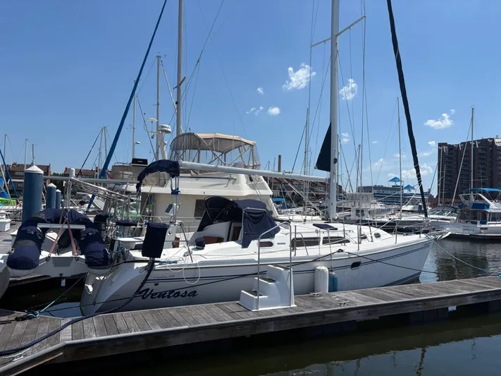 Ventosa Yacht Photos Pics Catalina 350 sailboat docked at marina, clear sky, 2006 model.