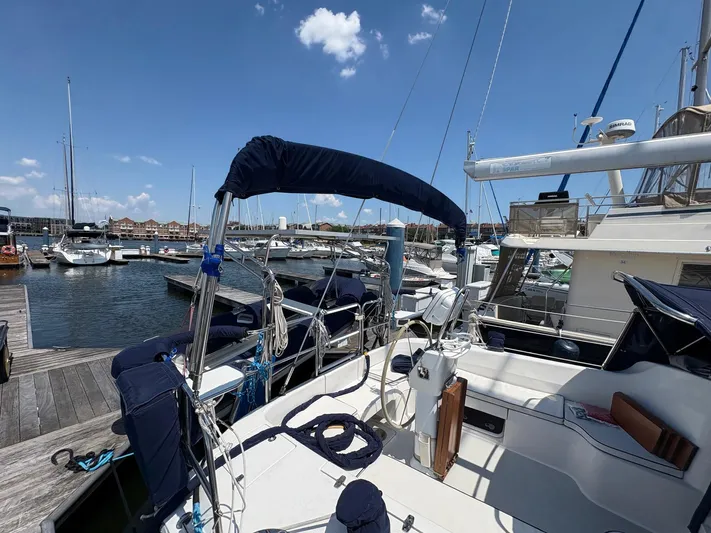 Ventosa Yacht Photos Pics 2006 Catalina 350 sailboat docked at marina under clear blue sky.