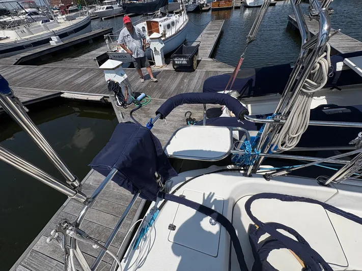 Ventosa Yacht Photos Pics Catalina 350 sailboat docked at marina, 2006 model, with nautical equipment visible.