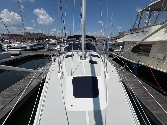 Ventosa Yacht Photos Pics Catalina 350 sailboat docked at marina, clear sky, 2006 model.