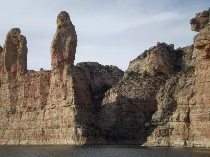Mv Belle Yacht Photos Pics Rock formations by the water, Custom Tour Boat and Business, 1987.
