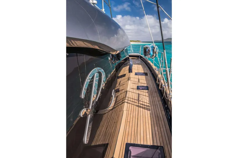 Relentless Yacht Photos Pics 2020 Sunreef Sail 60 yacht deck with sleek design and ocean view.