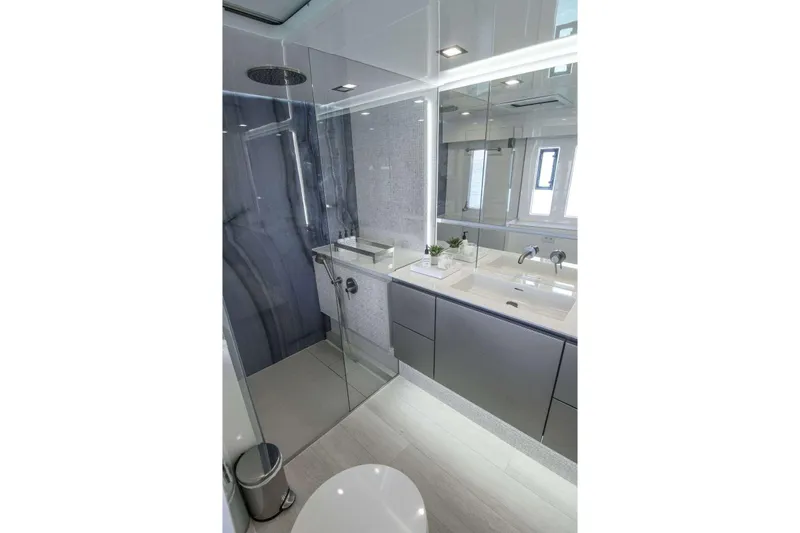 Relentless Yacht Photos Pics Luxurious bathroom in 2020 Sunreef Sail 60 yacht with modern fixtures and sleek design.