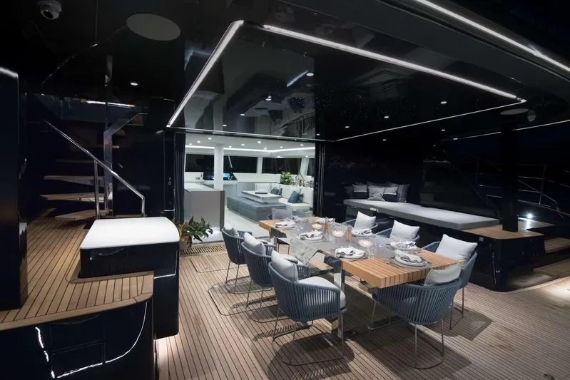 Relentless Yacht Photos Pics Luxurious 2020 Sunreef Sail 60 yacht interior with elegant dining area and modern design.