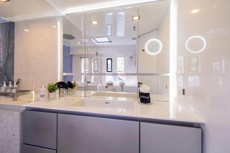 Relentless Yacht Photos Pics Luxurious bathroom on 2020 Sunreef Sail 60 yacht with modern fixtures and elegant design.