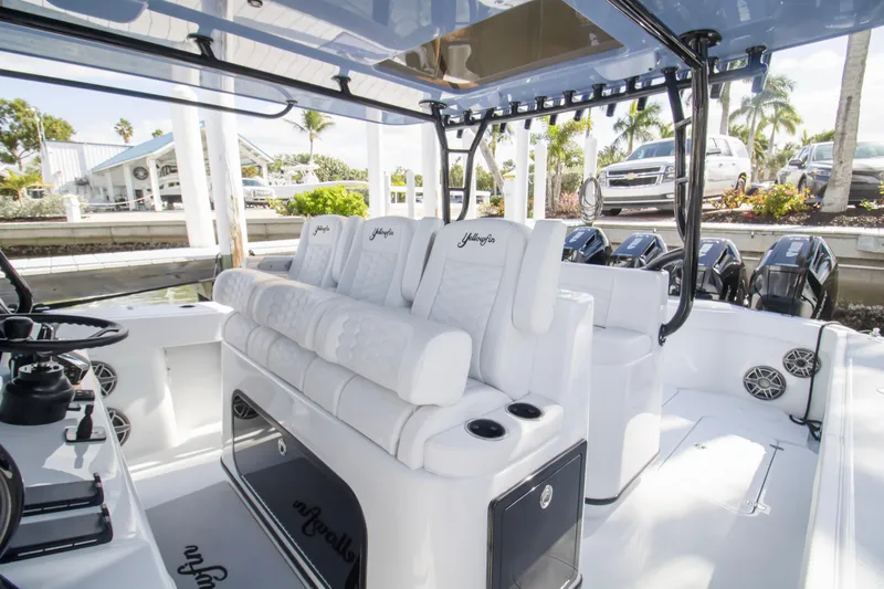  Yacht Photos Pics 2026 Yellowfin 42 Offshore boat interior with luxurious seating and modern design.