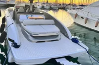 2024 Solaris Power 40 Open yacht docked at sunset, featuring sleek design and luxurious seating.