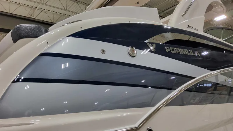 Sunny No Showers Yacht Photos Pics 2023 Formula 350 Crossover Bowrider OB, sleek design, blue and white exterior, indoor display.