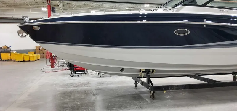 Sunny No Showers Yacht Photos Pics 2023 Formula 350 Crossover Bowrider OB in a showroom, side view.