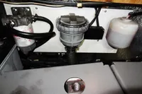 Engine compartment of a 2017 Leopard 43 Powercat showing fuel filter and components.