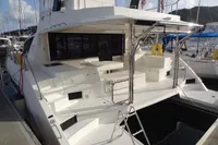 2017 Leopard 43 Powercat docked, rear view showing spacious deck and seating area.