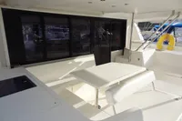 2017 Leopard 43 Powercat yacht interior with white seating and table.