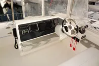 2017 Leopard 43 Powercat helm station with navigation equipment and steering wheel.