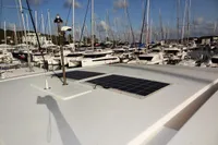 2017 Leopard 43 Powercat with solar panels docked in a marina.