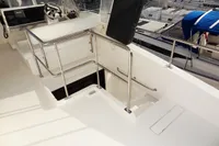 2017 Leopard 43 Powercat upper deck with helm station and stainless steel railings.